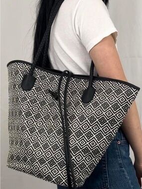 Neiman Marcus Tote bag coated raffia/strawlike woven style w/ Braided Handles